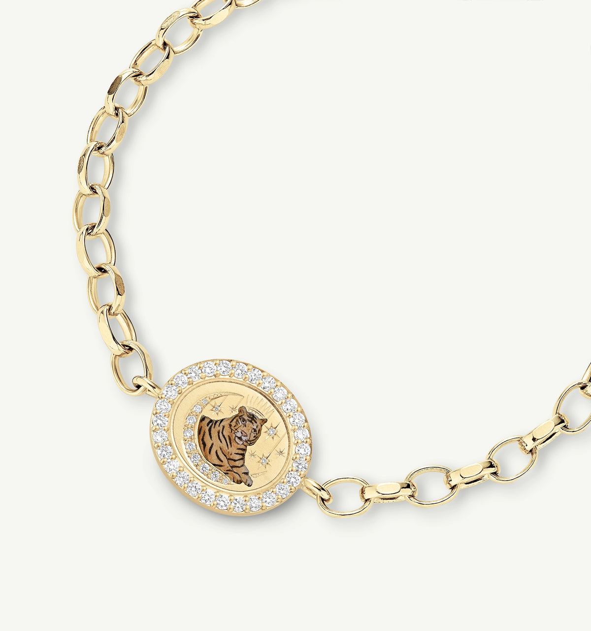 Gold bracelet featuring a tiger motif in enamel and surrounded by diamonds.