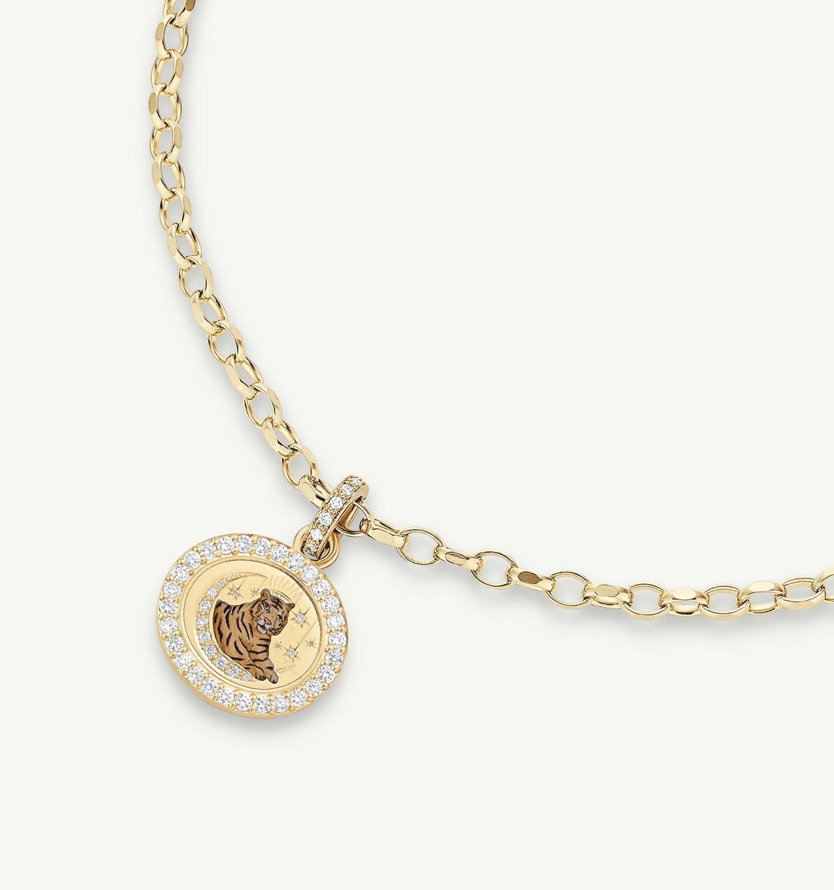 Gold necklace featuring a pendant with a tiger engraving surrounded by a halo of diamonds.