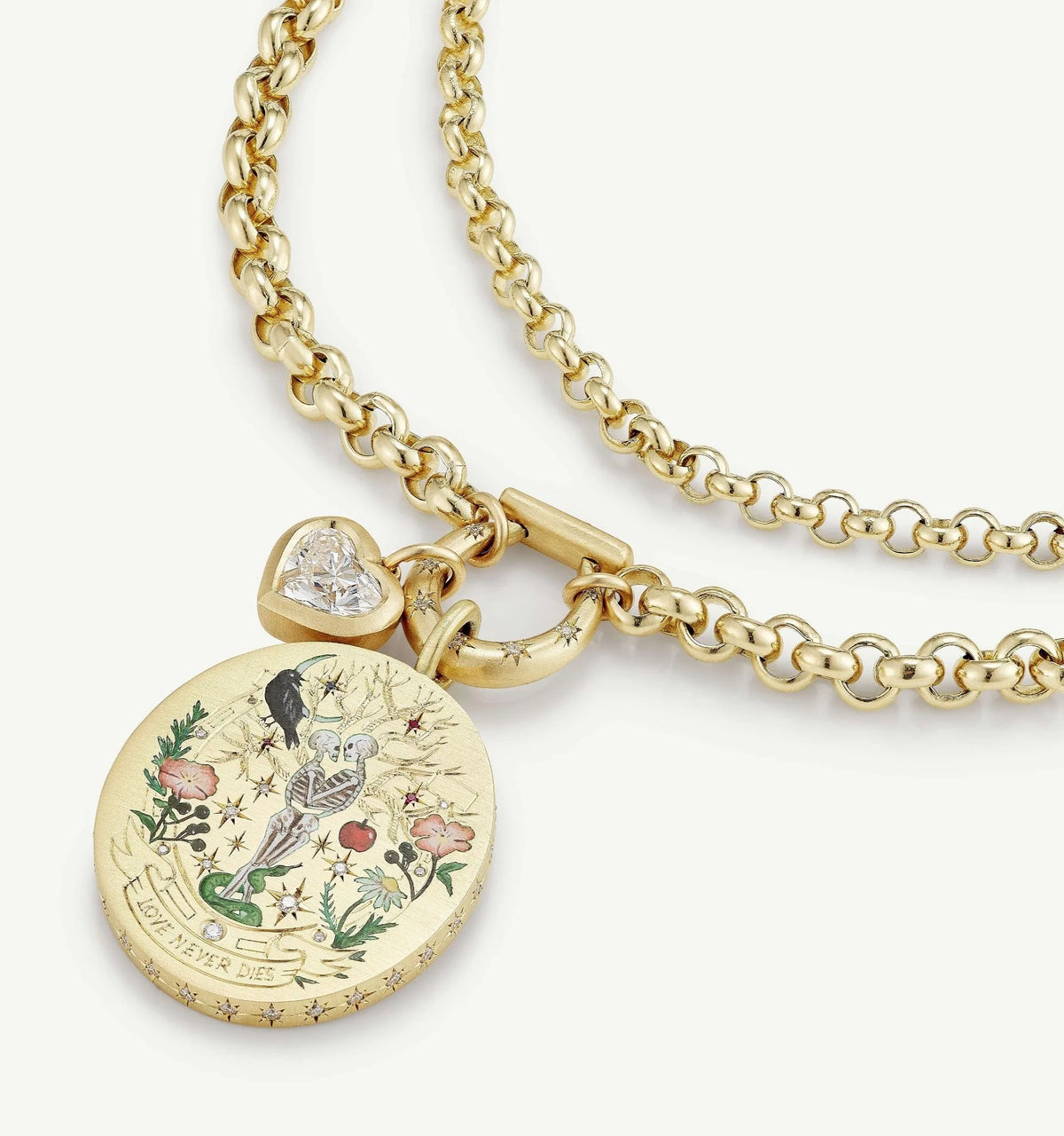 Gold chain necklace with a circular pendant featuring colourful floral designs and a heart-shaped diamond.