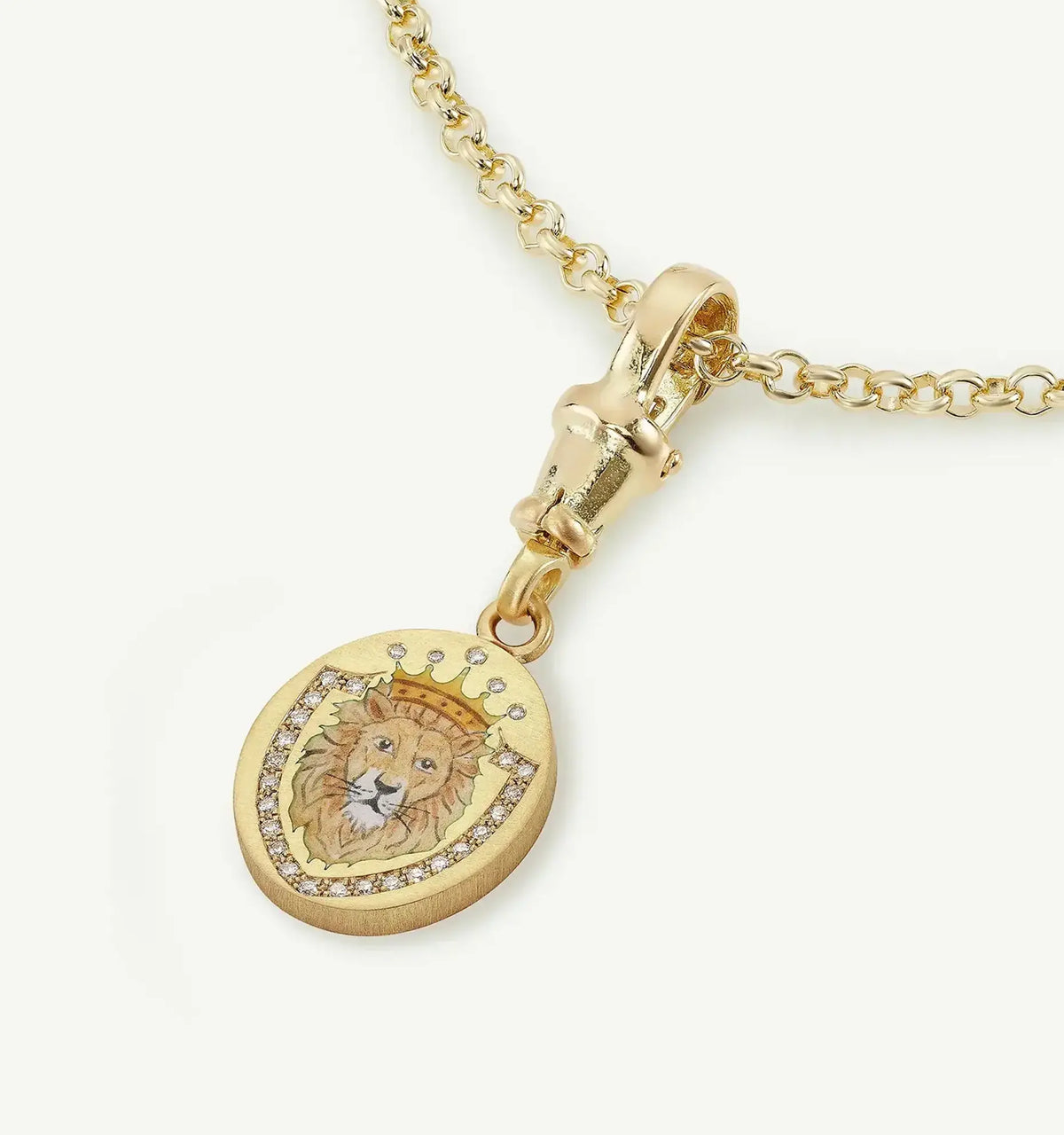Gold pendant featuring an engraved lion within a crown design, accented with small brilliant cut diamonds on a gold chain.
