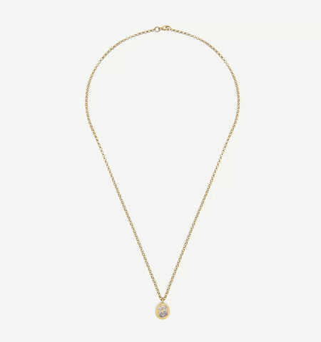 Gold necklace featuring an engraved pendant with floral design.