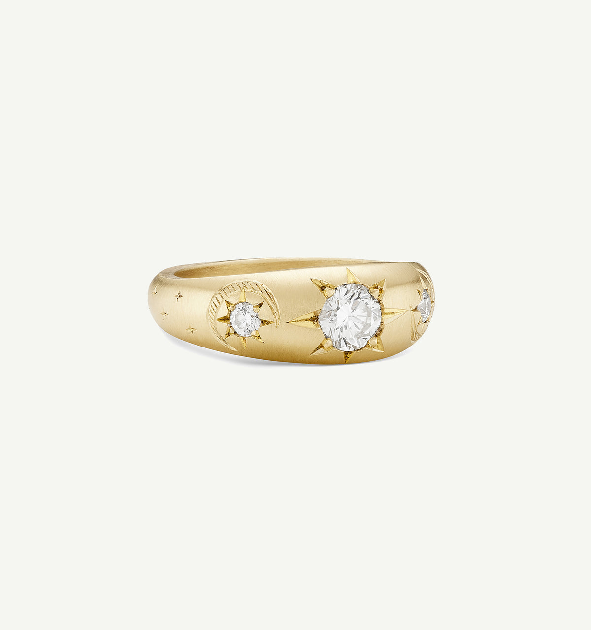 Gold ring featuring engraved sun and moon motifs with round diamonds.