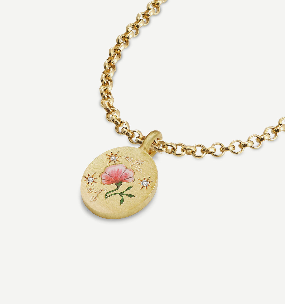 Gold pendant with an enamel flower motif and diamond accents on a gold chain necklace.