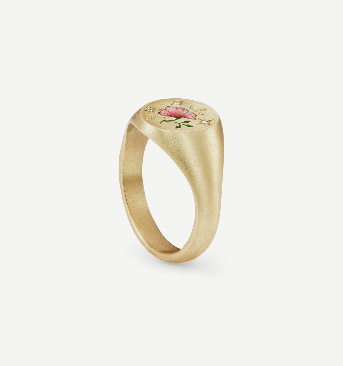 Gold ring featuring an enamel rose design and small gold flowers.