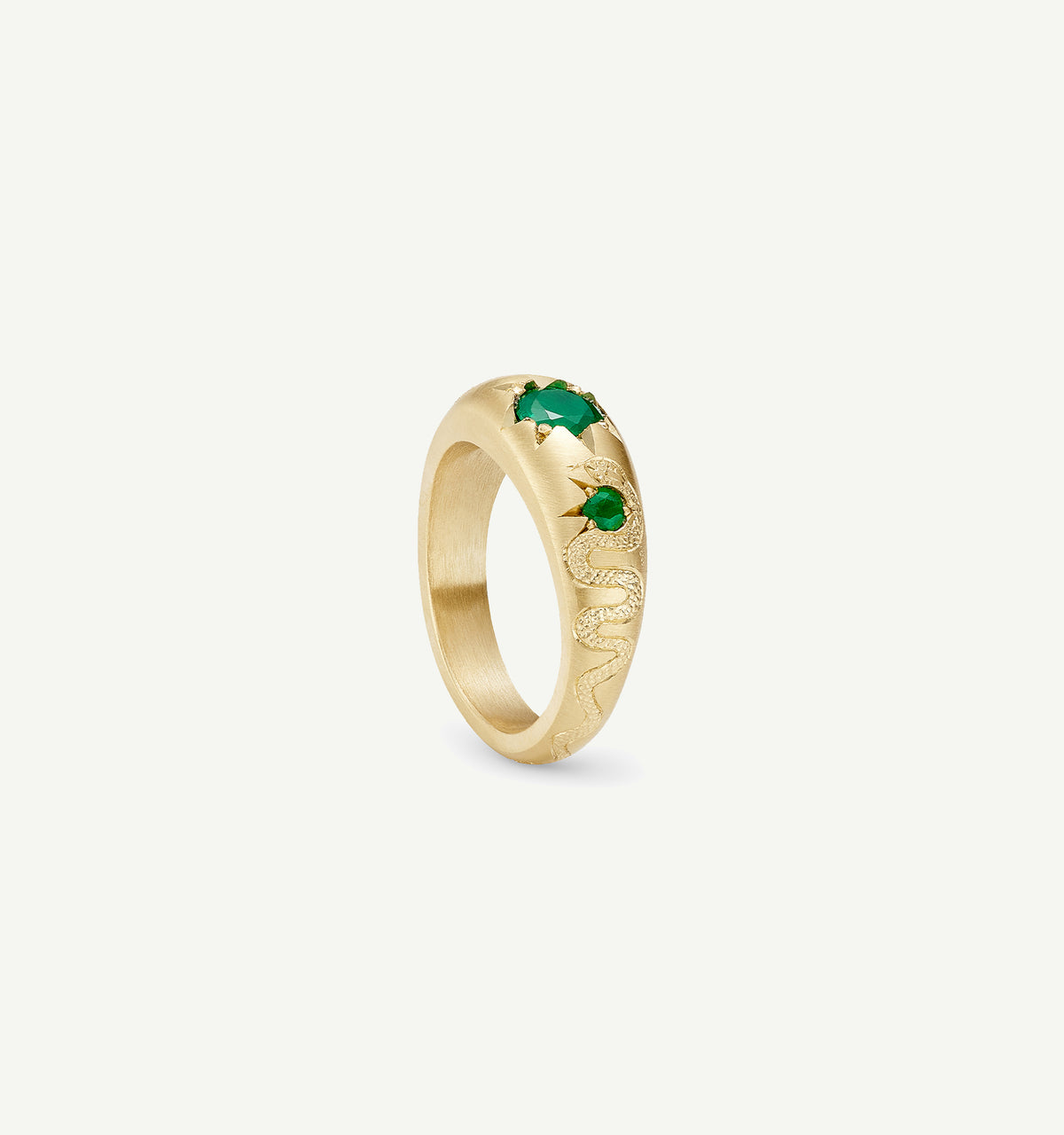 Gold ring featuring emeralds and a textured snake design.